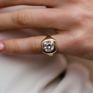 Chunky silver silhouette holding a moissanite with raw, radiant intensity A ring that blends heritage styling with contemporary edge Perfect for creating a signature, standout look