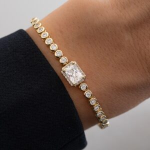 Luxe 14K Yellow Gold Diamond Bracelet with Emerald Cut Center Stone and Halo Frame, Bezel Set Round Diamond Link Design, Sophisticated Tennis Style Wrist Jewelry