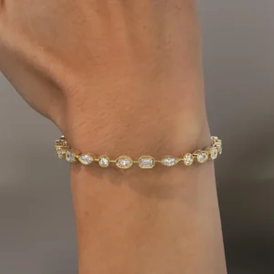 Mixed Shape Diamond Tennis Bracelet in Solid Yellow Gold with Bezel & Prong Set Stones Elegant Alternating Oval, Marquise & Emerald Cut Diamond Bracelet for Modern Luxury Look