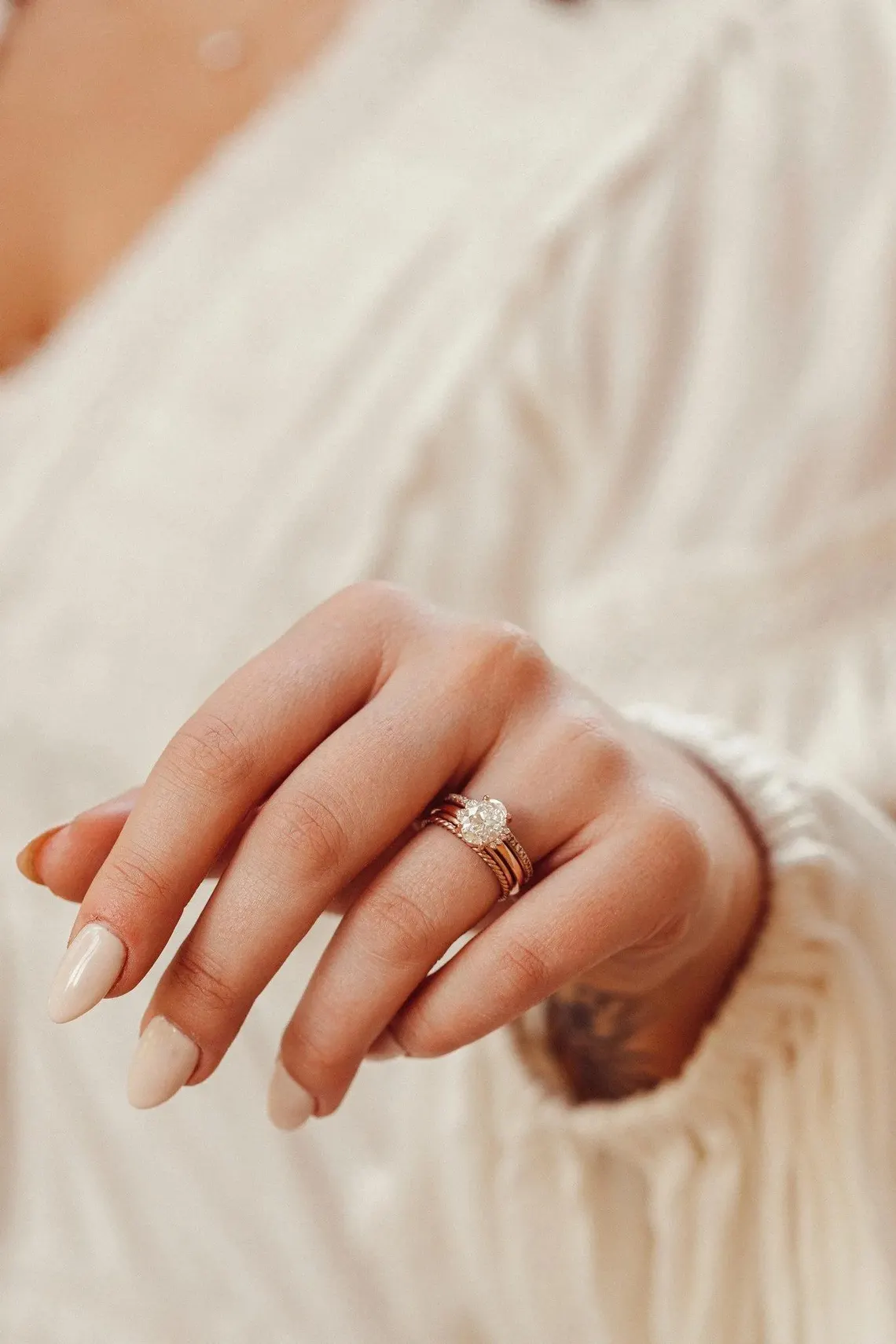 Duo band silver ring showcasing a moissanite with surrounding brilliance A look that blends structure with a rich, multi band aesthetic Perfect for a statement style with refined sparkle