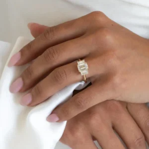 Duo band silver ring showcasing a moissanite with surrounding brilliance A look that blends structure with a rich, multi band aesthetic Perfect for a statement style with refined sparkle