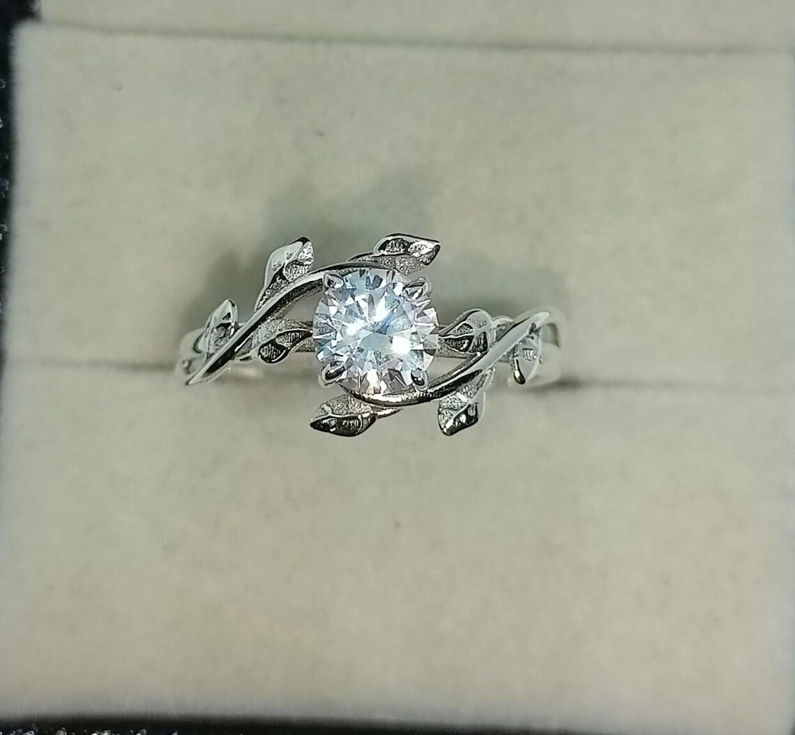 Nature Inspired Round Cut Moissanite Engagement Ring in Silver Unique Leaf Vine Design with Intricate Branch Detailing, Elegant Organic Style, Delicate Yet Eye Catching Bridal Jewelry for Women