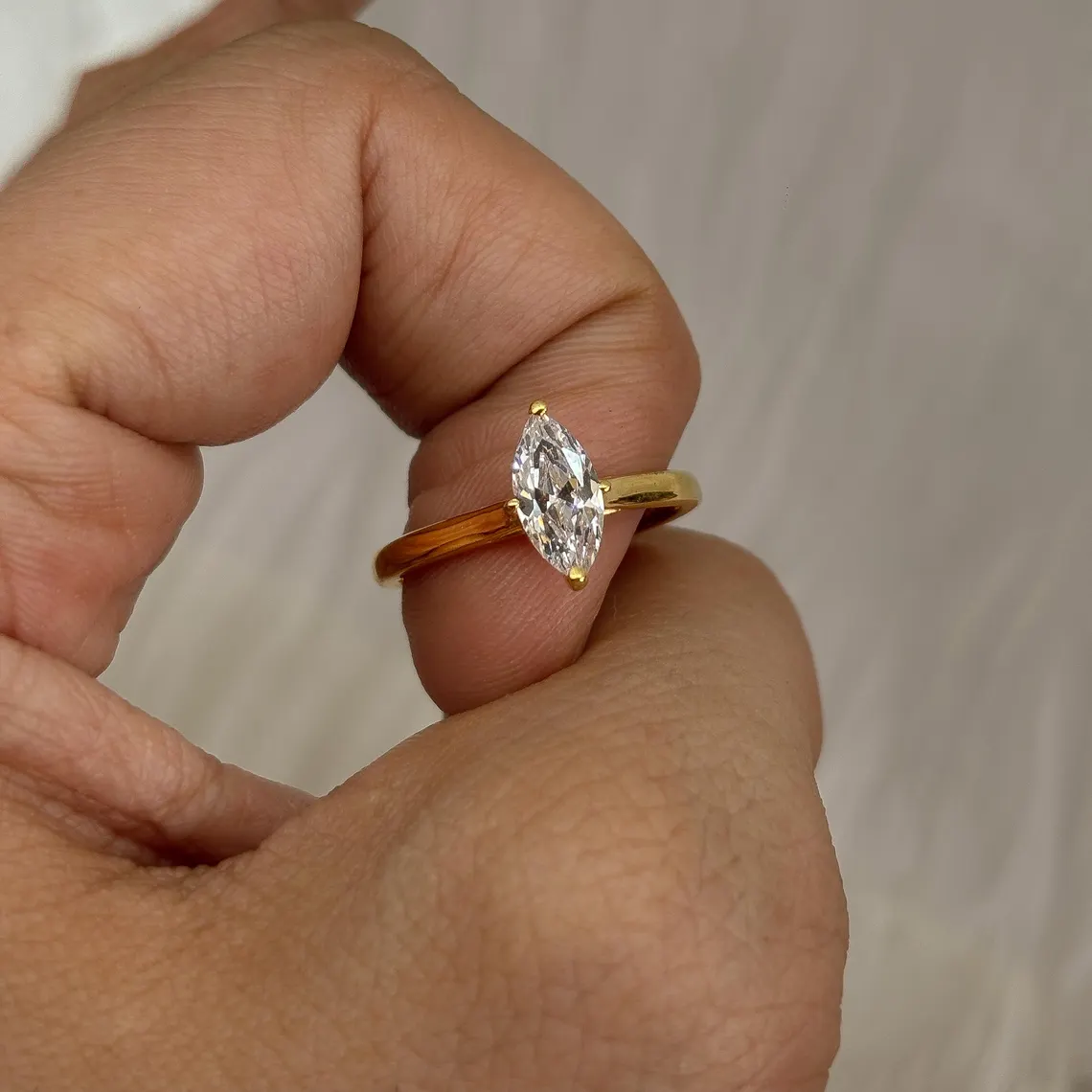 Elongated moissanite set in silver with a clean, flowing presence A design that feels airy, refined, and confidently different Perfect for elevating every gesture with subtle drama - Image 4