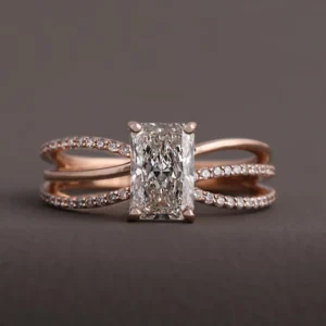 Radiant cut diamond engagement ring with split pavé band, crafted in 14K rose gold Modern luxury design with a bold center stone, flowing curves, and brilliant refined sparkle