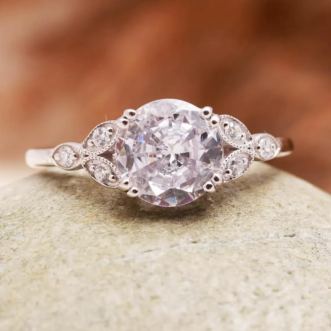Vintage Style Oval Cut Moissanite Engagement Ring in Silver Elegant Milgrain Leaf Design with Side Accent Stones, Antique Inspired Floral Band, Delicate Yet Eye Catching Bridal Jewelry for Women - Image 6