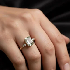 Prism clear moissanite centerpiece held in a sleek silver signature frame A piece that delivers depth, light play, and modern authority Designed for standout styling with a luxury edge