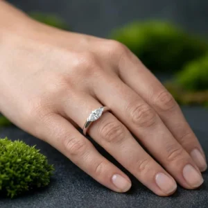 Navette cut moissanite set in a slimline silver band with precision taper A design that delivers a sleek contour with a sharp, refined edge Made for a clean, elongated statement with modern clarity