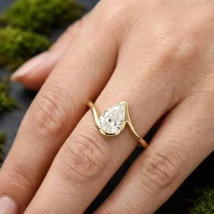A sculpted silver band holding a glowing moissanite centerpiece Where creativity meets refined sparkle in perfect balance Designed for elegance that feels different and unforgettable
