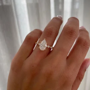 Alurise Pear Shaped Diamond Engagement Ring in Solid Yellow Gold with Marquise Side Diamonds Delicate Three Stone Minimalist Ring for Women