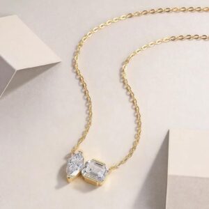 Distinctive Two Stone Diamond Pendant Necklace Featuring Brilliant Round and Step Cut Gemstones in 14k Yellow Gold Stylish Fine Jewelry Daily Wear Luxury Style
