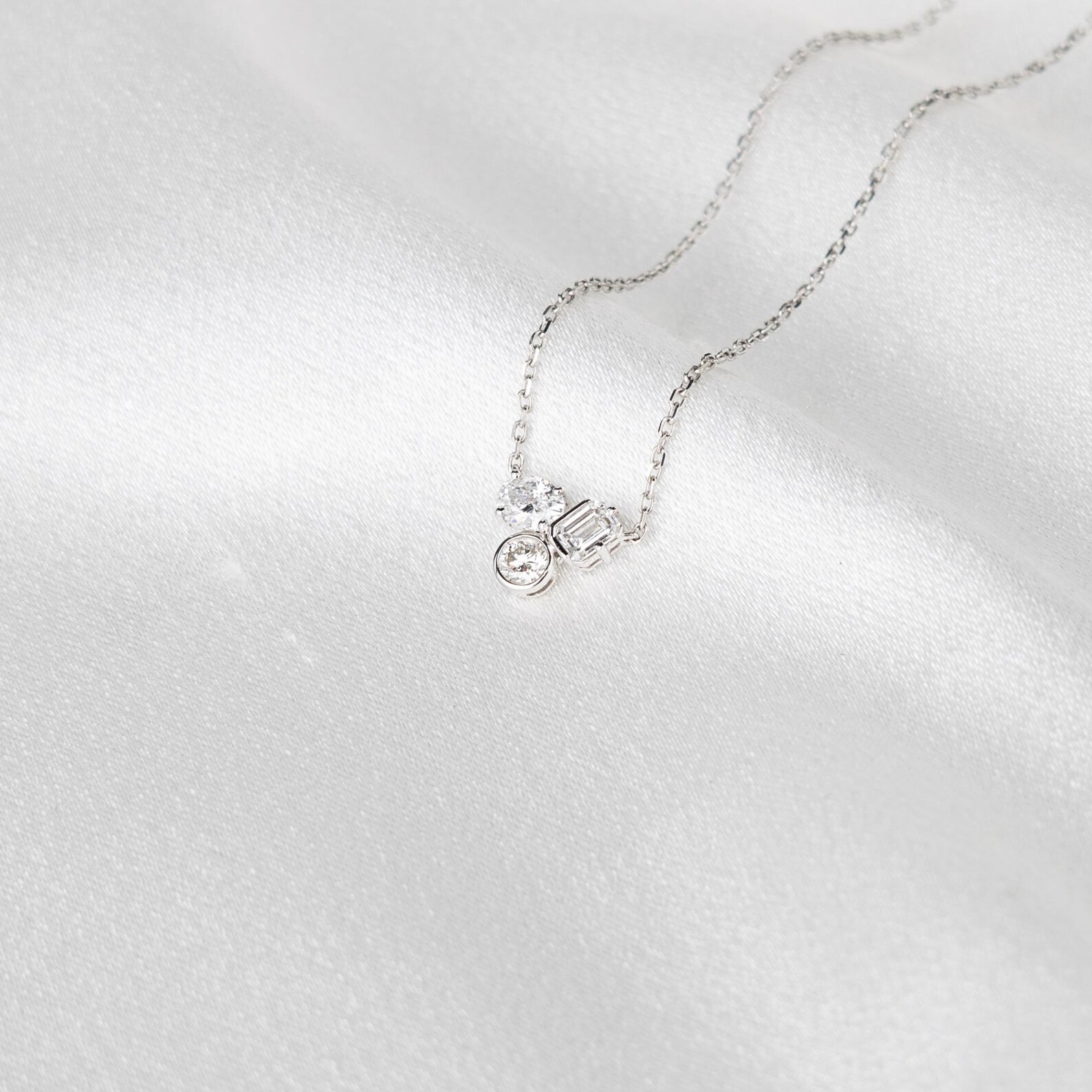 Necklace in 14K Gold with Floating Multi Stone Design and Soft Sparkle Flow Dainty Minimal Pendant Jewelry for Everyday Wear with a Modern Graceful Luxury Touch Elegant Curved Diamond - Image 4