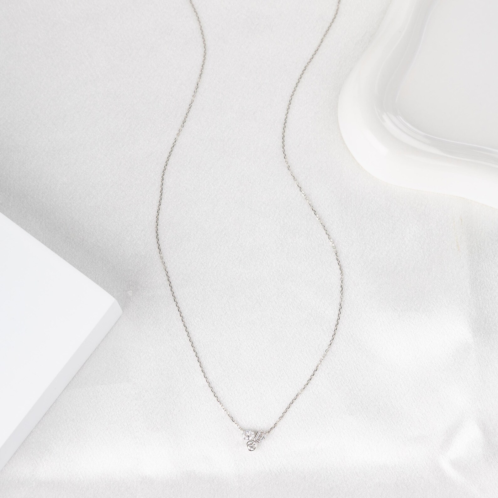 Necklace in 14K Gold with Floating Multi Stone Design and Soft Sparkle Flow Dainty Minimal Pendant Jewelry for Everyday Wear with a Modern Graceful Luxury Touch Elegant Curved Diamond - Image 5