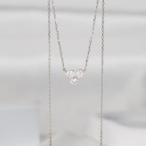 Necklace in 14K Gold with Floating Multi Stone Design and Soft Sparkle Flow Dainty Minimal Pendant Jewelry for Everyday Wear with a Modern Graceful Luxury Touch  Elegant Curved Diamond