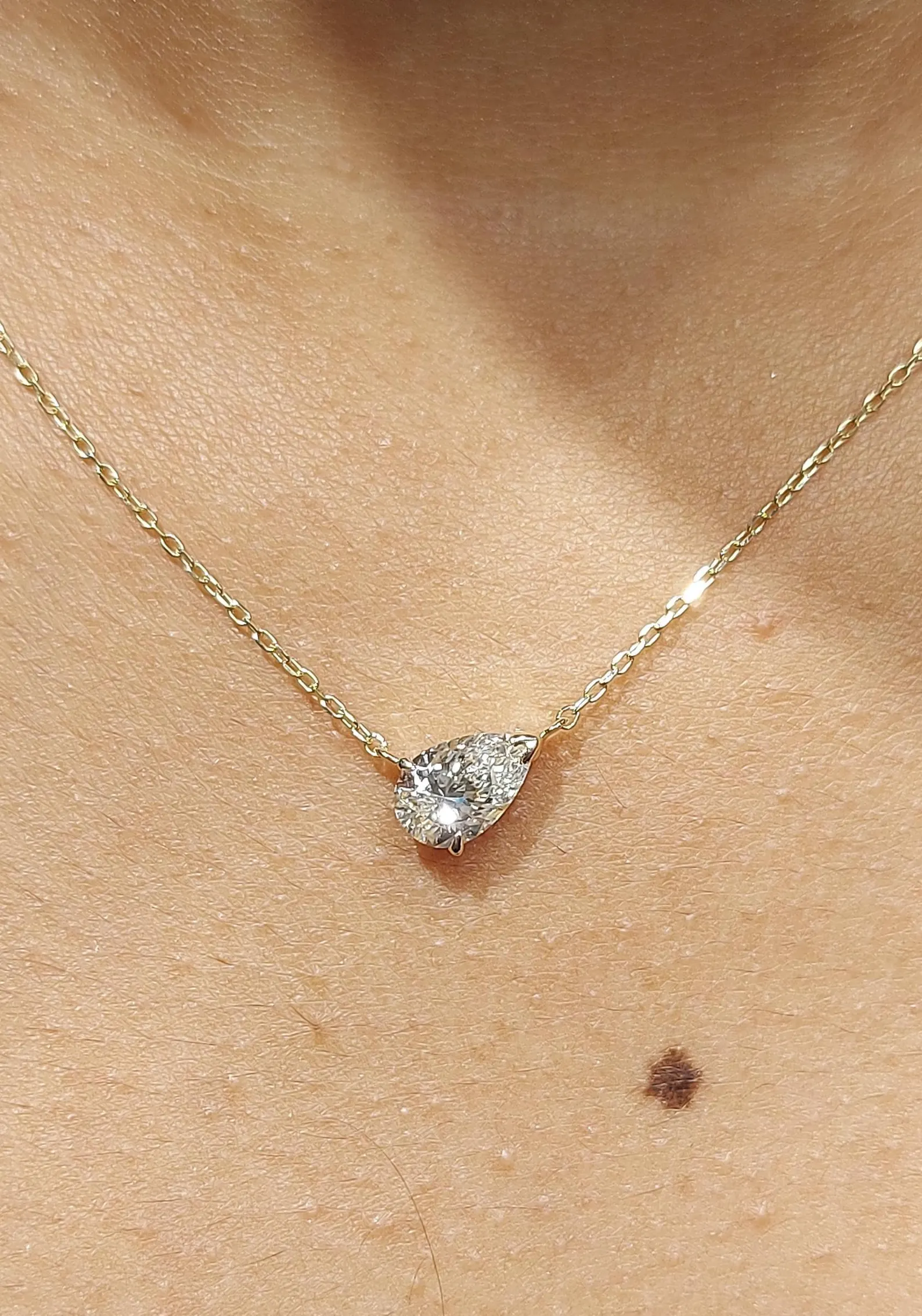 Asymmetrical Pear Diamond Pendant Necklace Designed in 14k Yellow Gold Sleek Sideways Setting Fine Jewelry Gift Modern Teardrop Diamond Necklace Lightweight Minimal Chain Elegant Sophisticated Jewelry for Women - Image 3