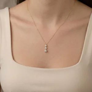 Graceful Vertical Sparkle and Soft Feminine Flow Elegant Three Stone Drop Diamond Necklace in 14K Gold with Dainty Minimal Pendant Jewelry Designed for Timeless Everyday Luxury and Refined Delicate Styling