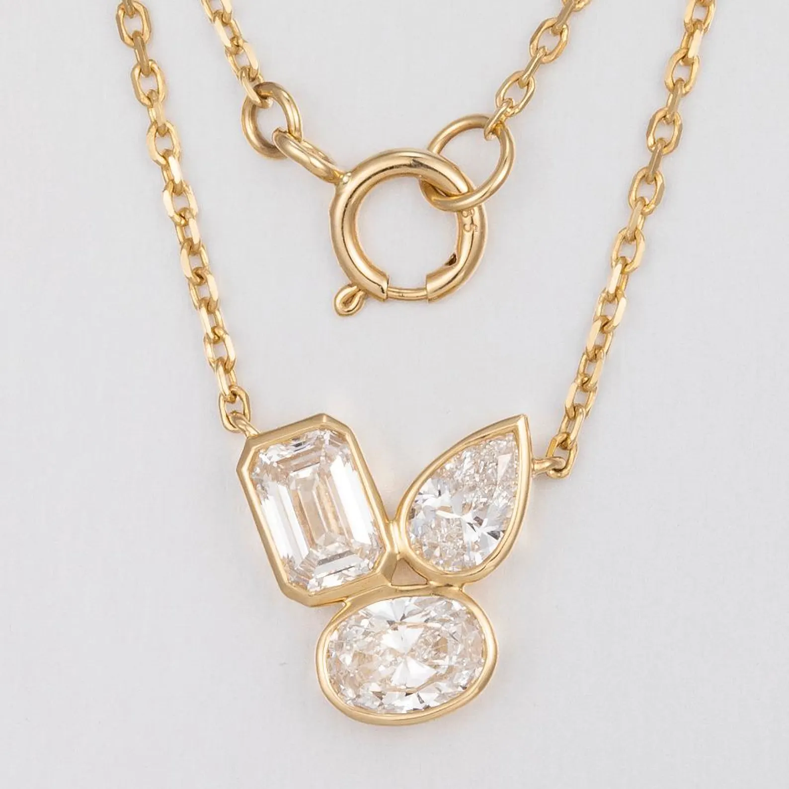 Unique Artistic Layout and Modern Multi Shape Diamond Pendant Necklace in 14K Gold Featuring Emerald Pear and Oval Stones Dainty Statement Jewelry Piece with Geometric Elegance Designed - Image 3