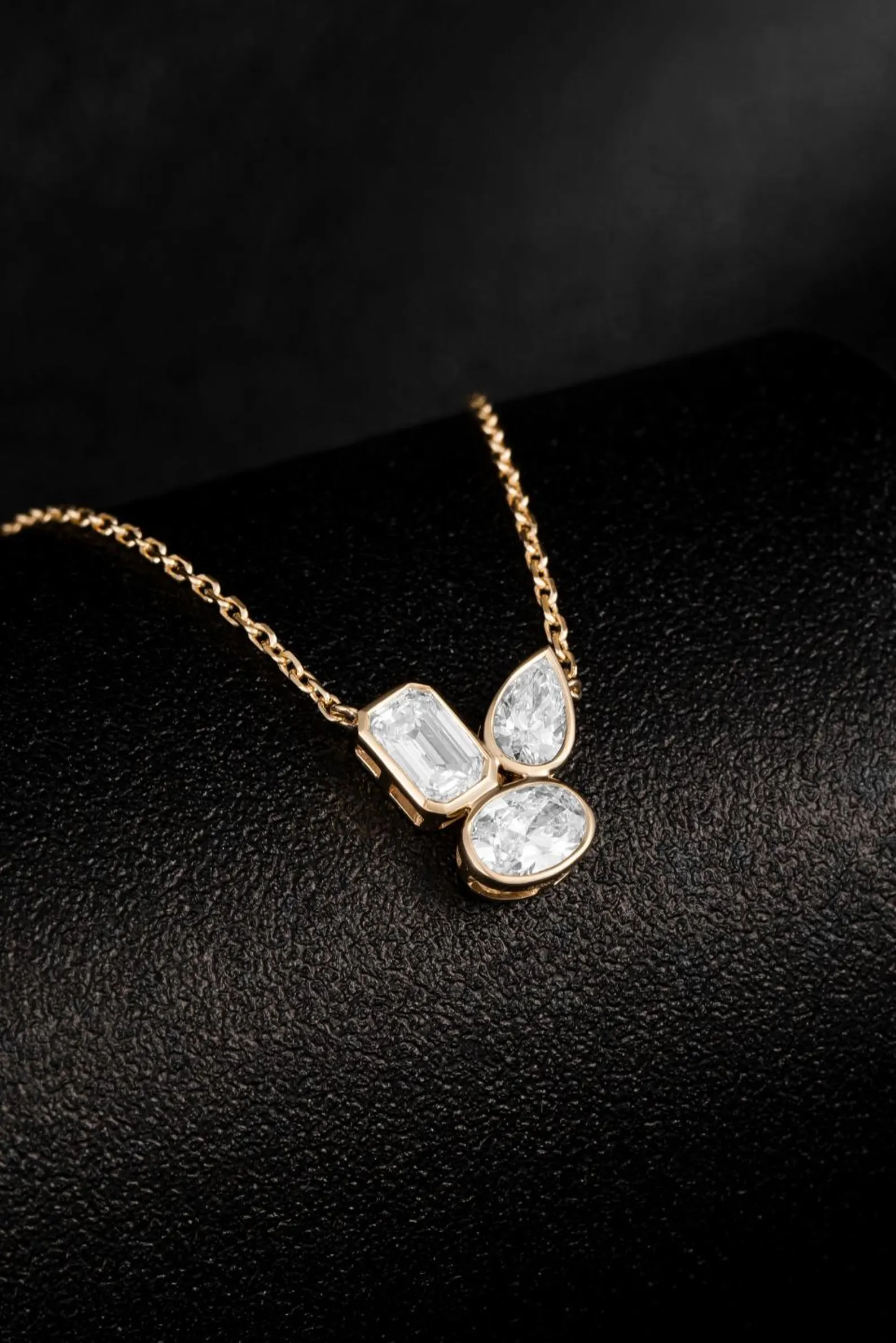 Unique Artistic Layout and Modern Multi Shape Diamond Pendant Necklace in 14K Gold Featuring Emerald Pear and Oval Stones Dainty Statement Jewelry Piece with Geometric Elegance Designed - Image 2