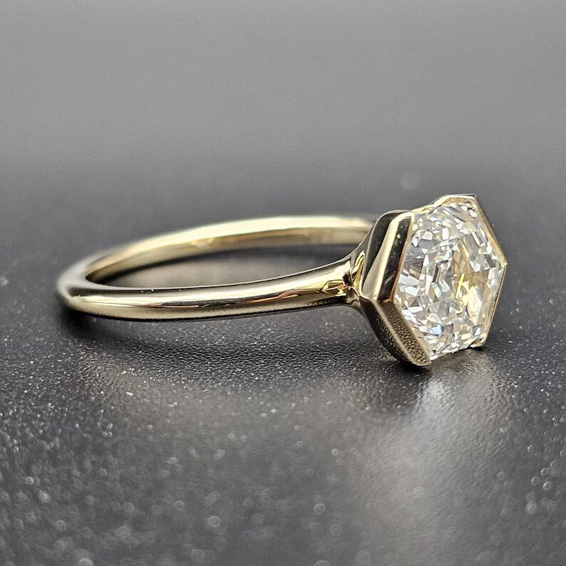 Hexagon cut diamond solitaire engagement ring in a sleek bezel setting, crafted in 14K yellow gold Luxury modern design with bold geometry, refined elegance, and high end sophisticated sparkle - Image 2