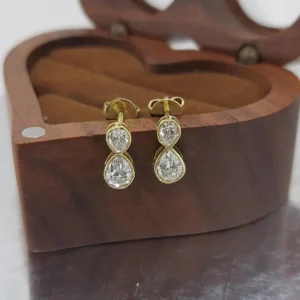 Refined Gold Diamond Earrings for Women Designed with Pear Shape Stones in Layered Drop Style Elegant Fine Jewelry Gift Idea