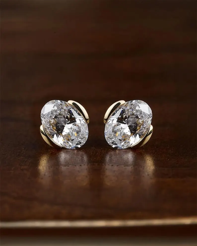 Glowing Oval Cut Diamond Stud Earrings in 14k Yellow Gold, Bold Bezel Style Solitaire Design with Smooth Modern Setting, Large Statement Sparkle, Elegant Fine Jewelry for Bridal, Anniversary, and High End Everyday Wear