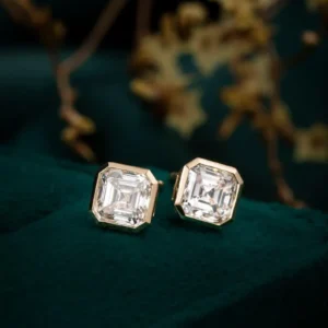Elegant Asscher Cut Diamond Stud Earrings in 14k Yellow Gold, Octagonal Step Cut Solitaire with Modern Bezel Setting, Vintage Art Deco Inspired Design with Clean Geometric Lines, Timeless Minimalist Fine Jewelry Gift for Women
