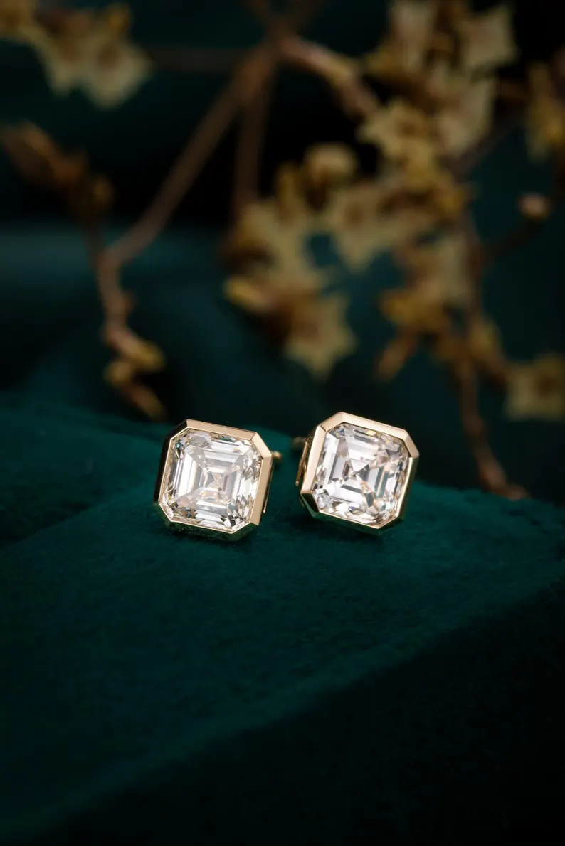 Elegant Asscher Cut Diamond Stud Earrings in 14k Yellow Gold, Octagonal Step Cut Solitaire with Modern Bezel Setting, Vintage Art Deco Inspired Design with Clean Geometric Lines, Timeless Minimalist Fine Jewelry Gift for Women
